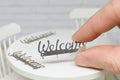 Metal "Welcome" Wall Rack (1:12 scale) stainless steel